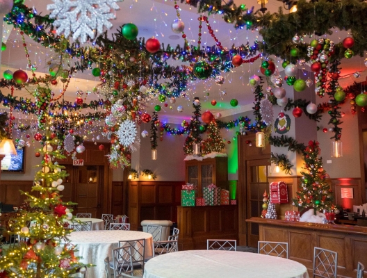festive christmas room adorned with elegant decorations, sparkling lights, and holiday ornaments at royal park