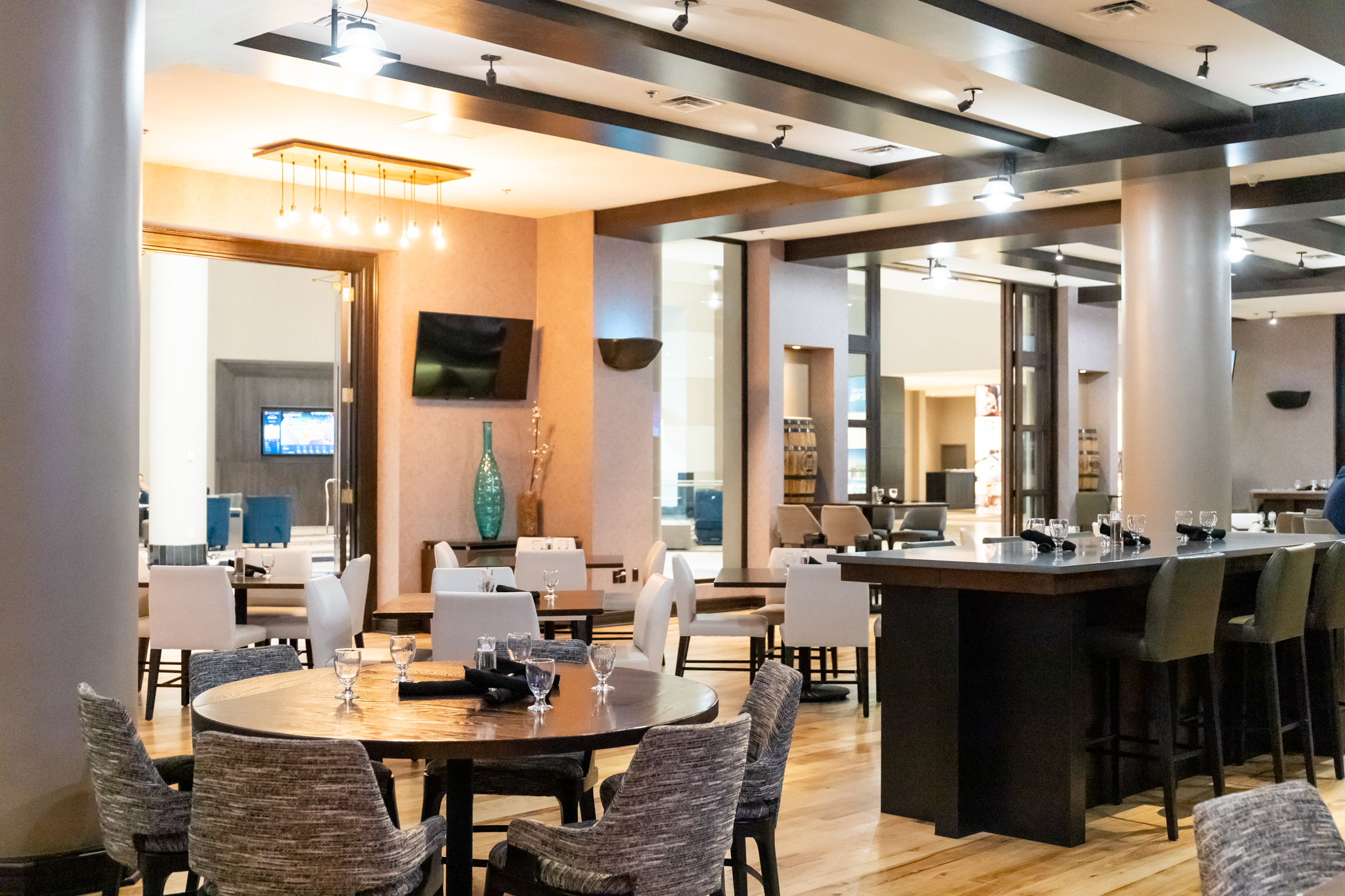 The restaurant at the Little Rock Marriott filled with tables and high-top seating