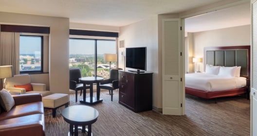 king suite with city view and seating area
