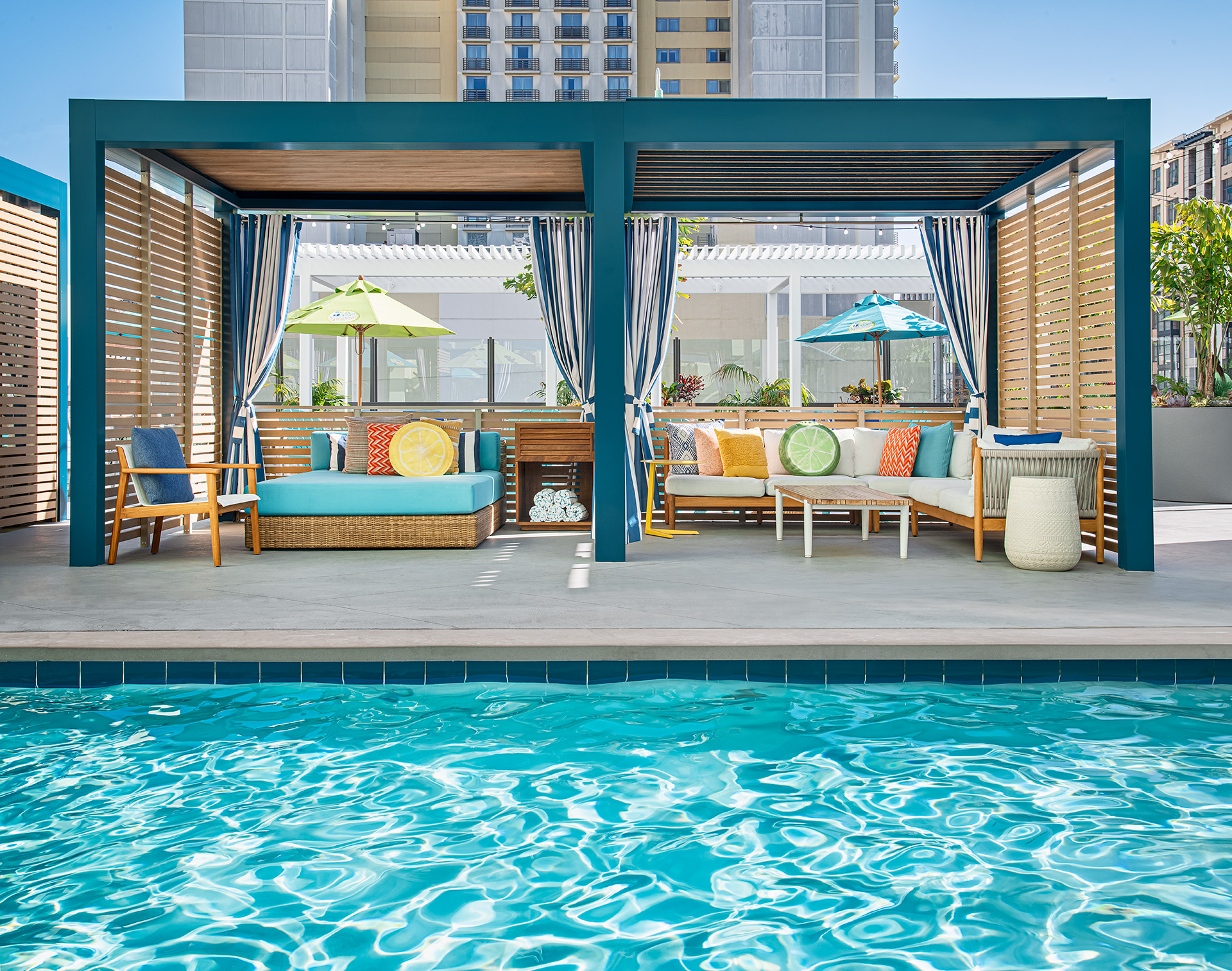 Large cabanas at a pool