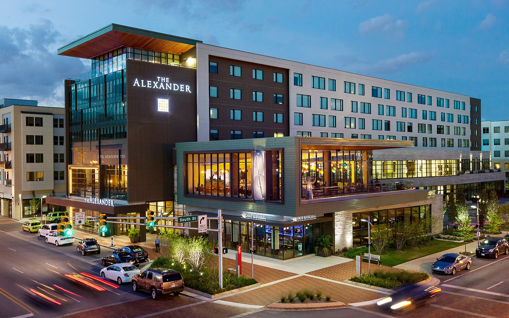 The exterior of The Alexander hotel as seen as dusk