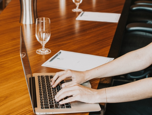 A individual working at a laptop