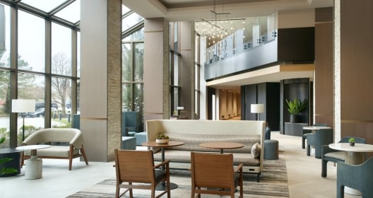 Lobby with seating and large windows