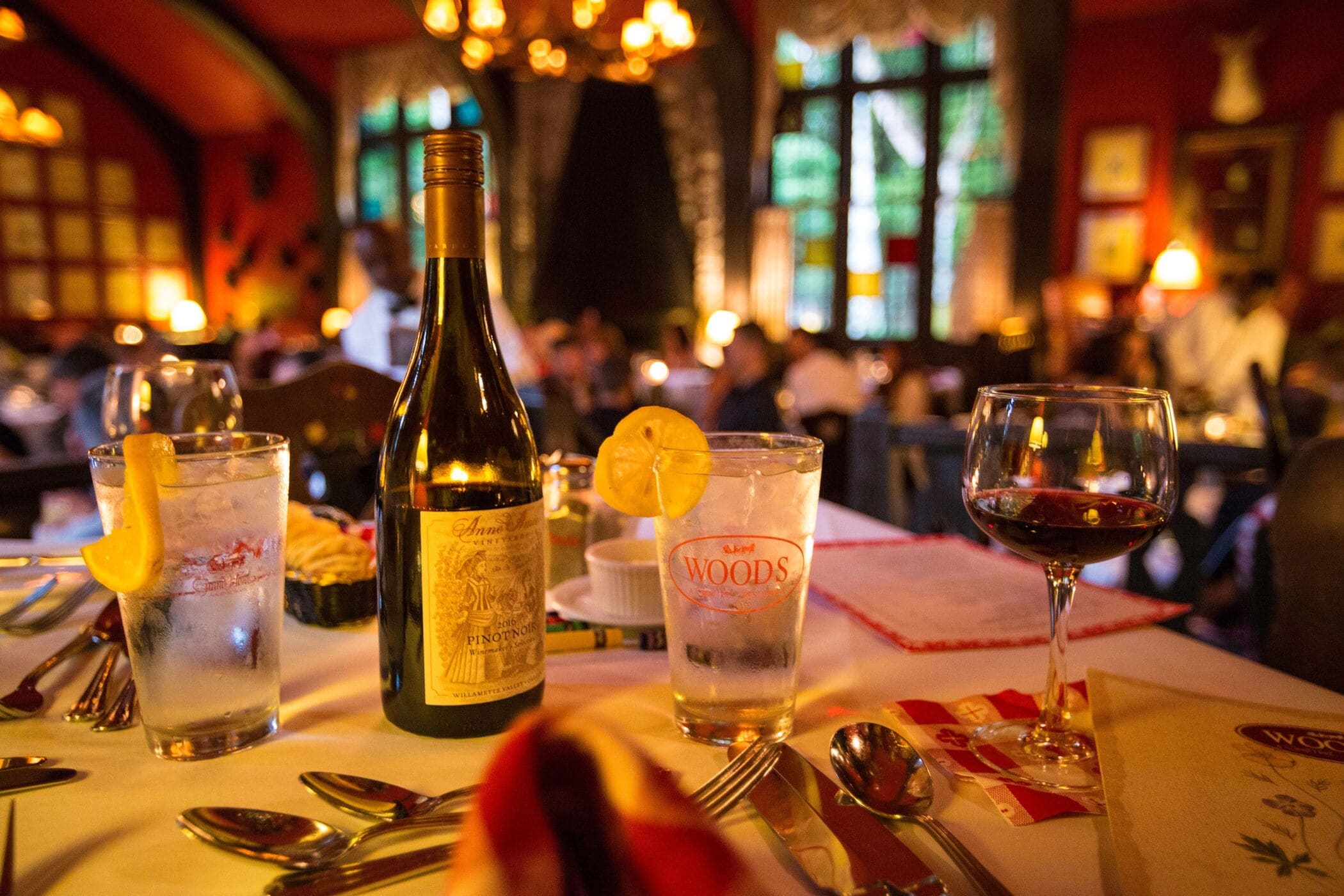 Restaurant with bottle of wine and menus