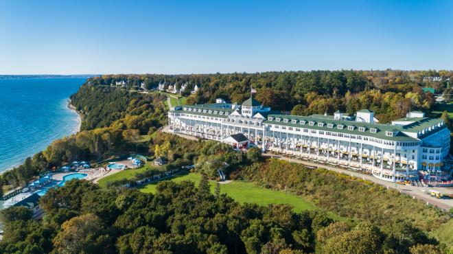 The exterior of The Grand Hotel. The ocean can be seen in the background.