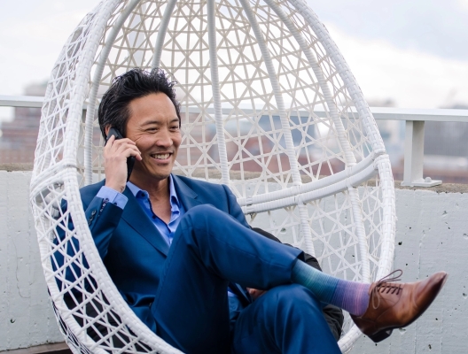 Man sitting in egg chair