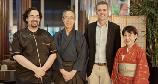 Japanese Tea Master Akihiki Kaji and his wife in traditional clothing for a Japanese tea ceremony activation at Nobu Hotel