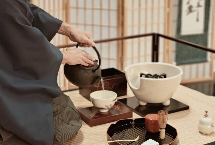 Japanese tea master performing a traditional tea ceremony at Nobu Hotel.