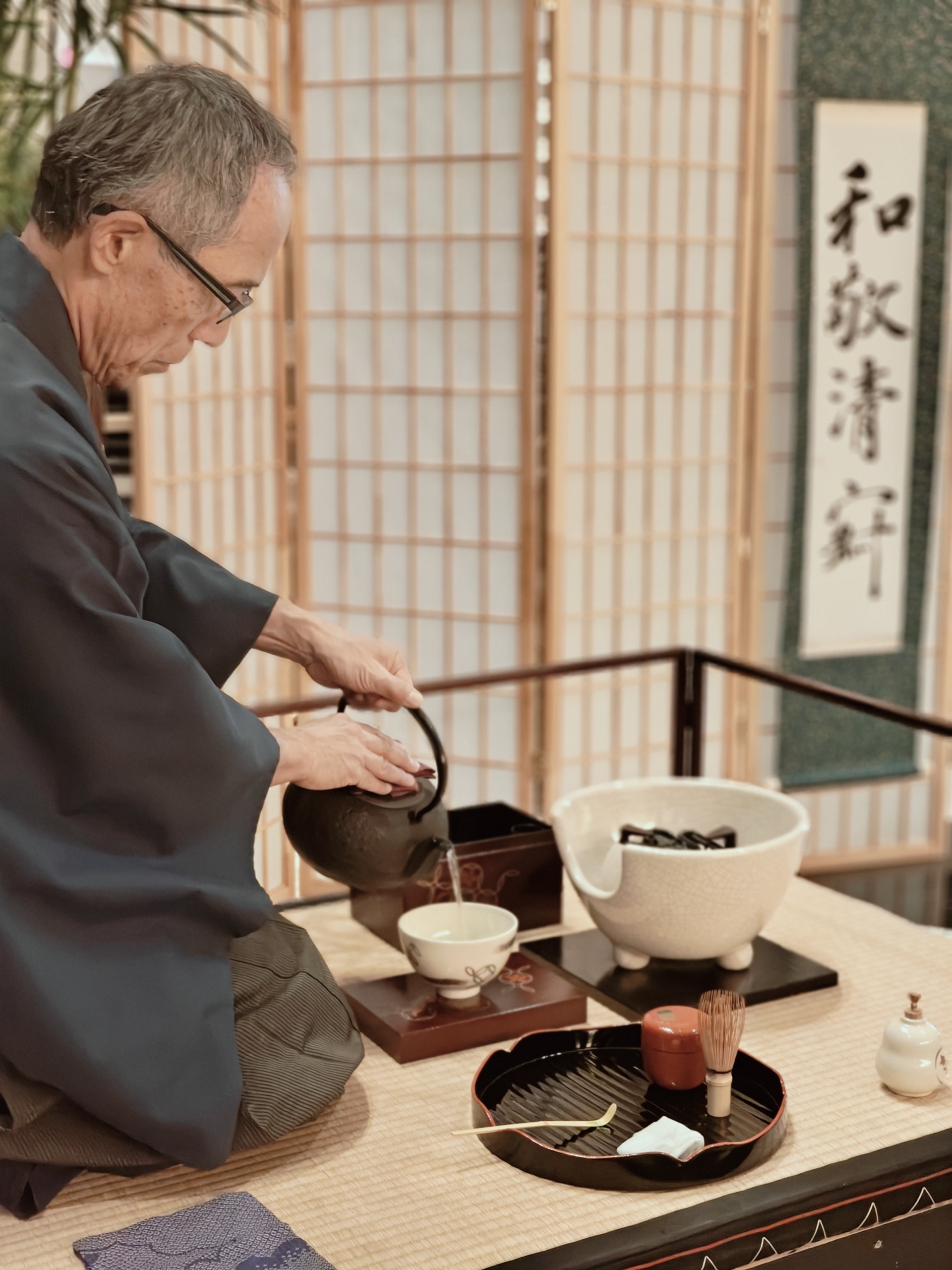 Japanese tea master performing a traditional tea ceremony at Nobu Hotel.